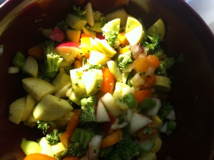 Washed, chopped organic yellow squash, broccoli, orange pepper, & gala apple in juice from fresh lemon and lime... 